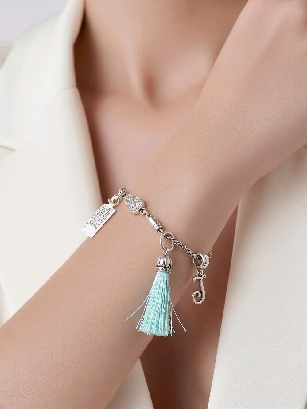 Brighton Charm bracelet with tassel.